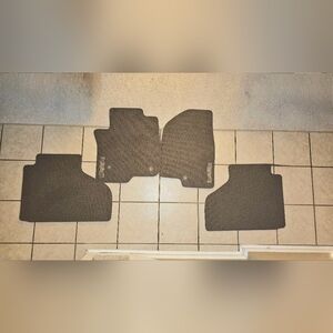 New 2021-2025 OEM 4-piece GMC Yukon Tahoe Floor Mat Set. Taupe.